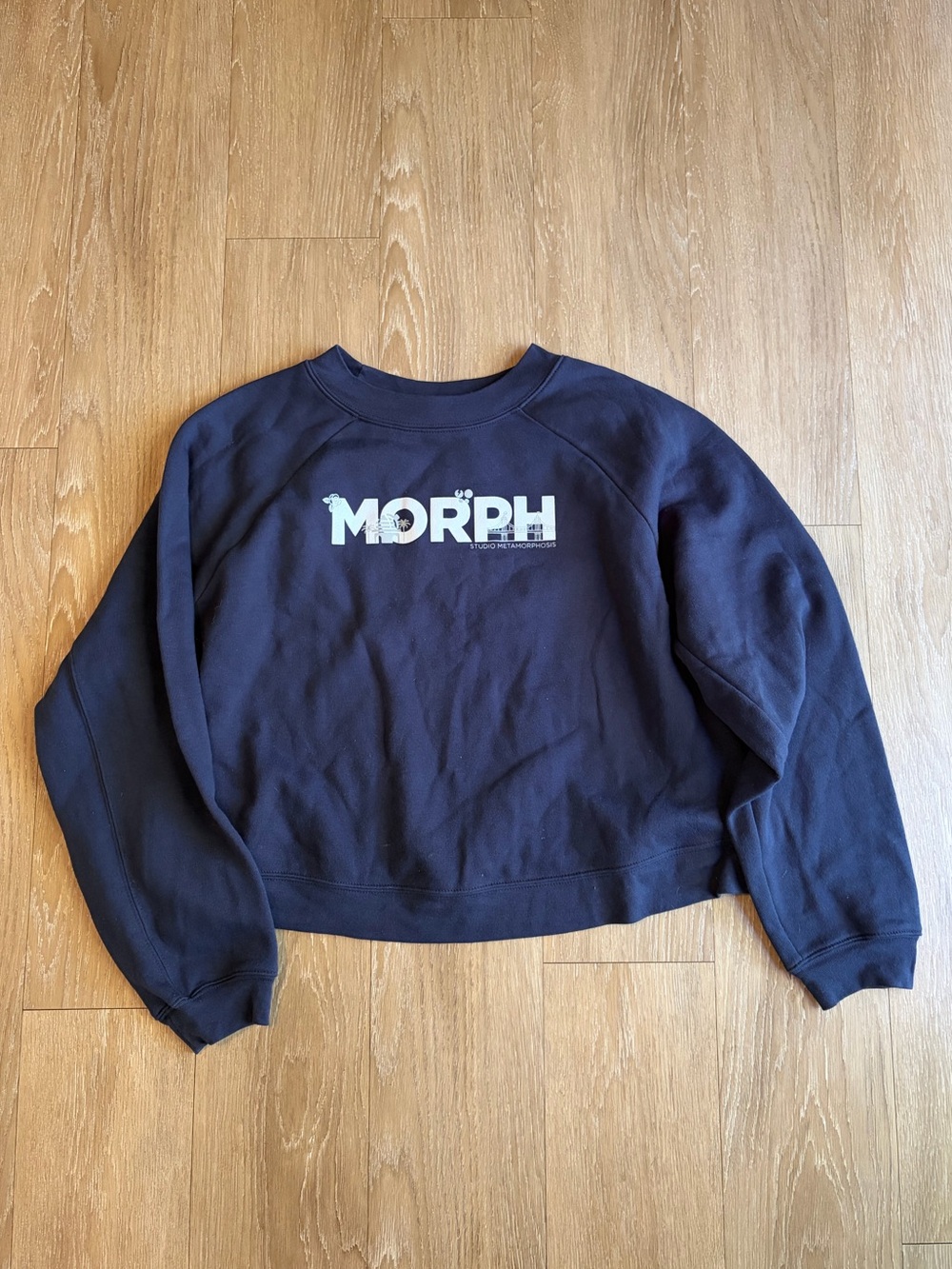 Bella + Canvas Navy Crewneck Sweatshirt w/ White Morph Studio Metamorphosis Logo